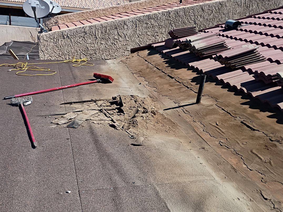Before: Flat section between tile roofs