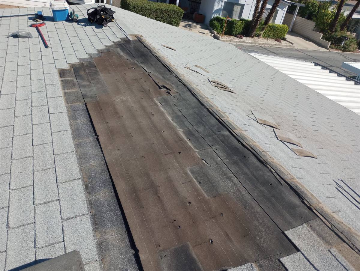 Shingle valley torn back to the old felt