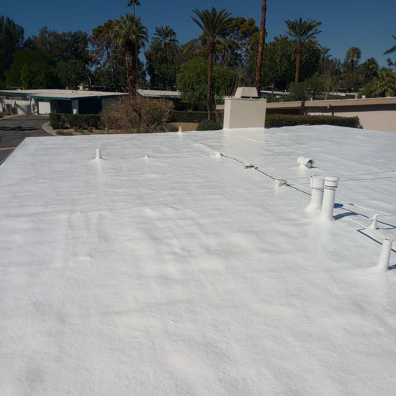 Every vent sealed: Vent stacks and conduit foamed in and coated on a finished roof.