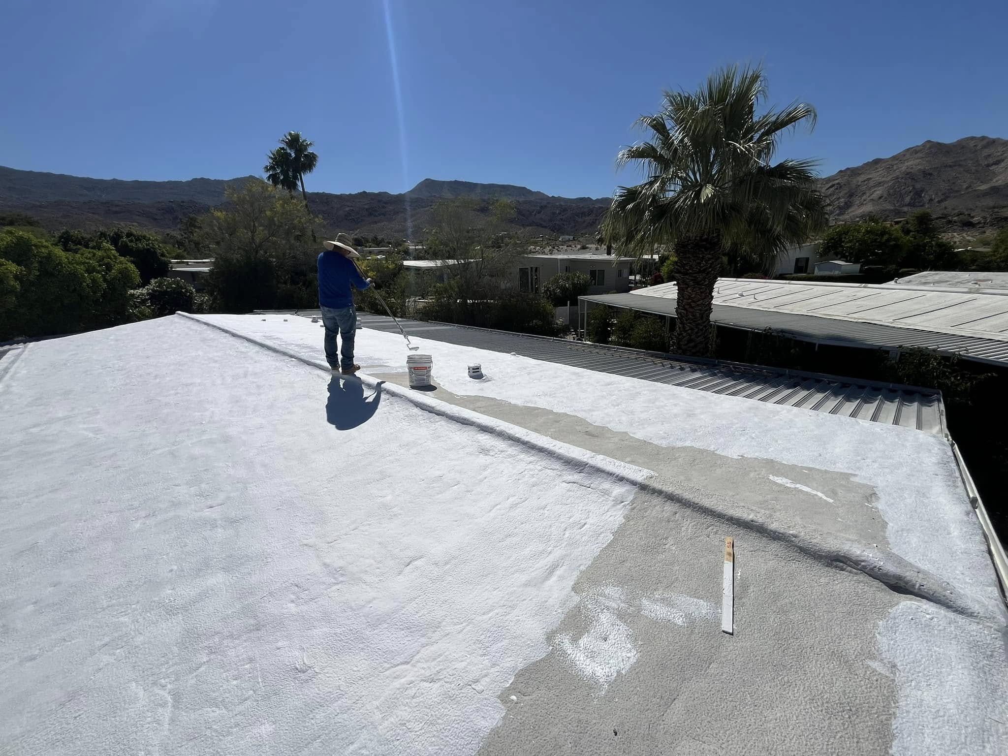 Cool roof coating reflecting sunlight on a Coachella Valley home