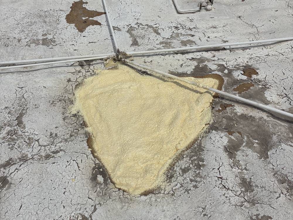 New polyurethane foam sprayed into a roof repair